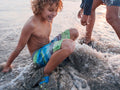 Kids playing at the beach in KEEN sandals